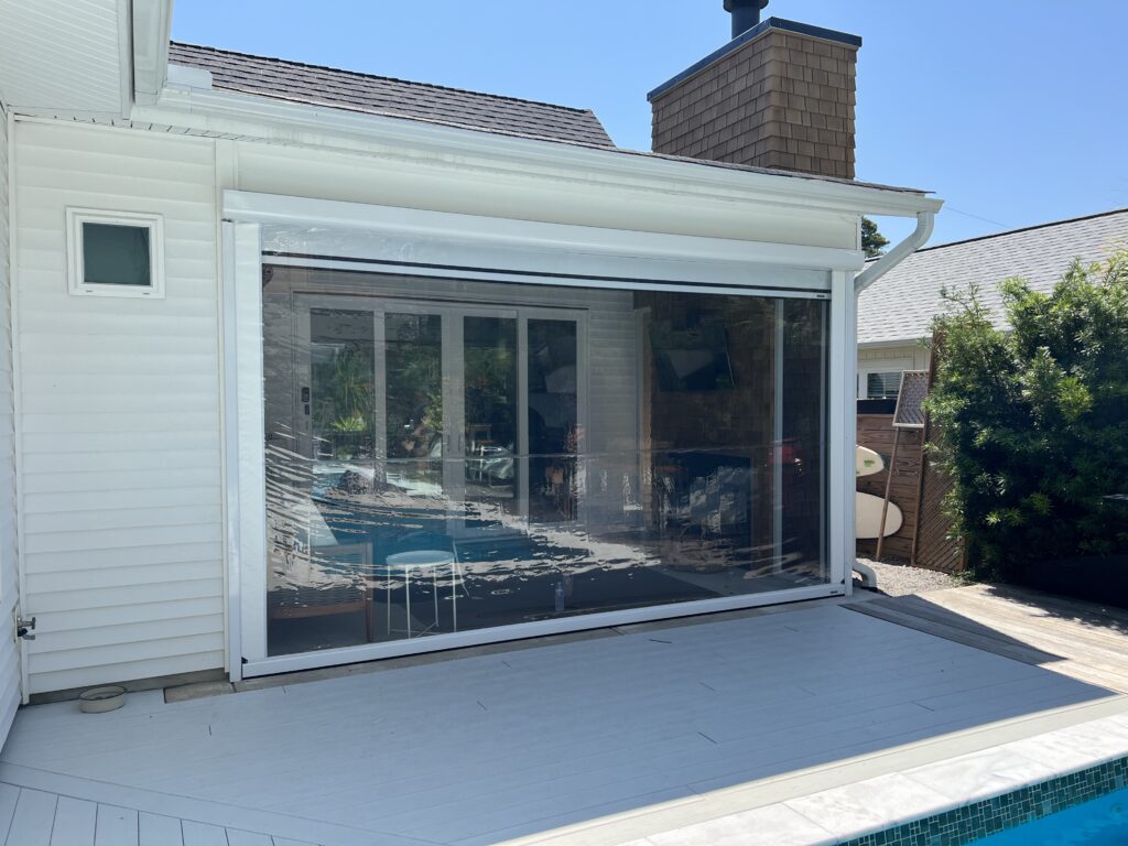 Clear patio screen with pool view