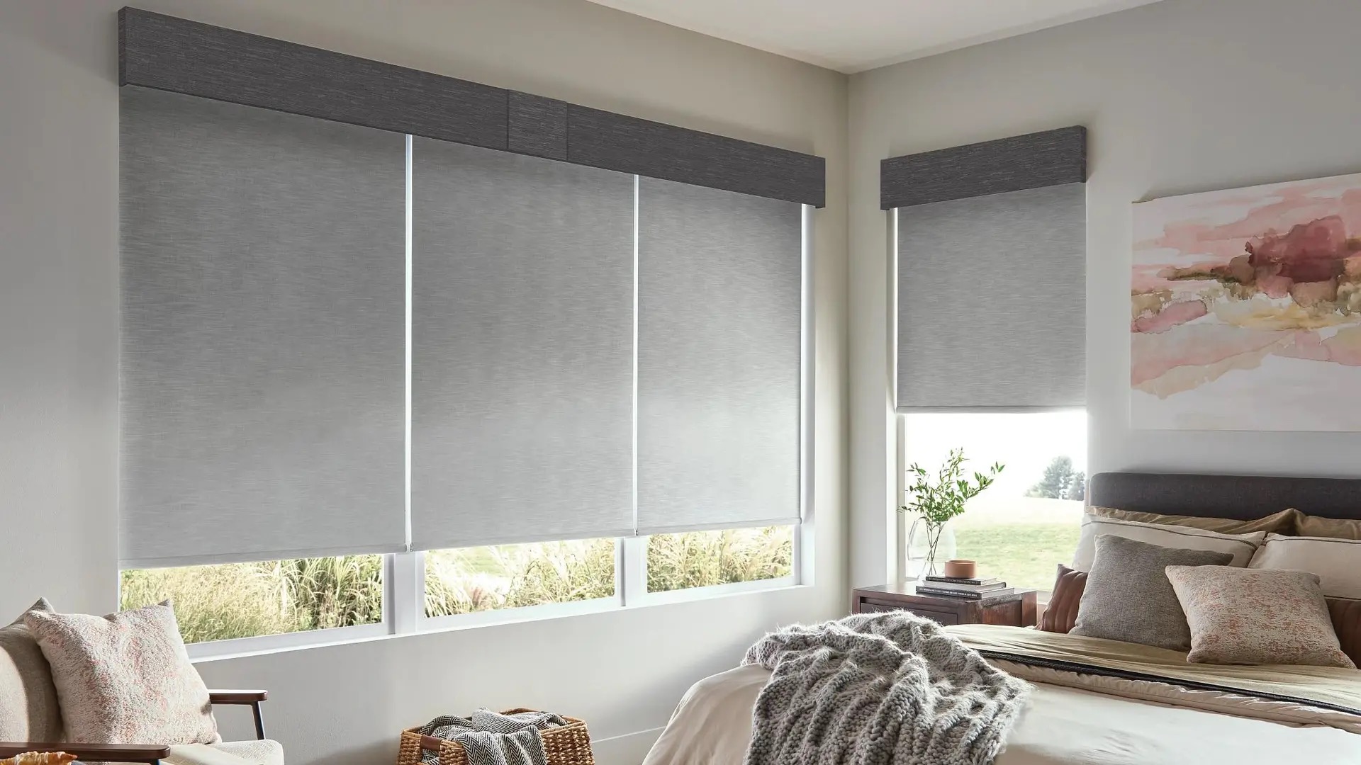Modern bedroom with gray roller shades